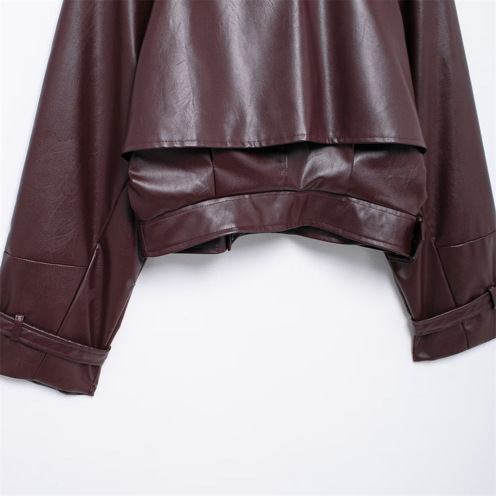 Kurze Motorradjacke mit Knopfdekoration und Revers